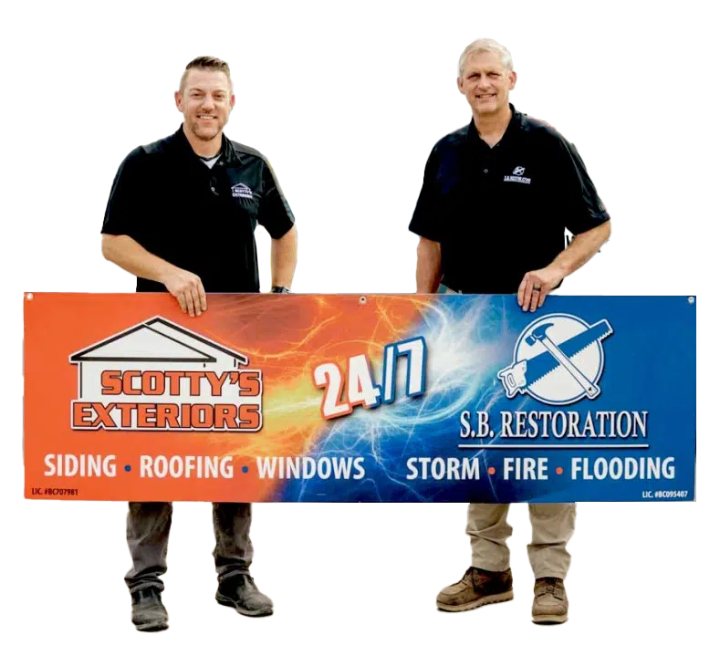 John and Jeff pictured holding a banner with both Scotty's Exteriors and SB Restoration logos