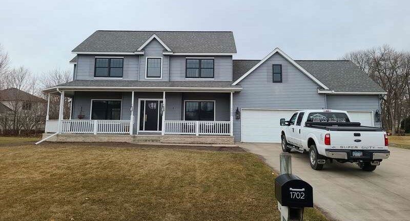 Before photo of home in Sartell where roofing, siding and stone will be done