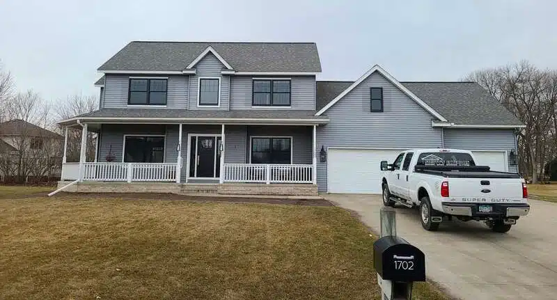 Before photo of home in Sartell where roofing, siding and stone will be done